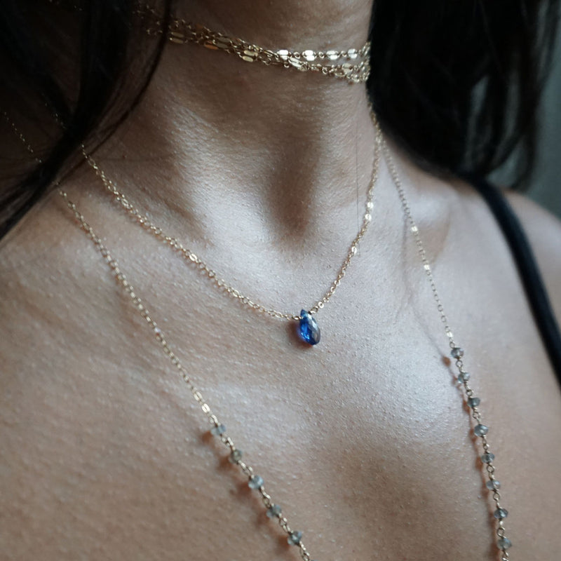 layered gold necklaces with kyanite gemstone