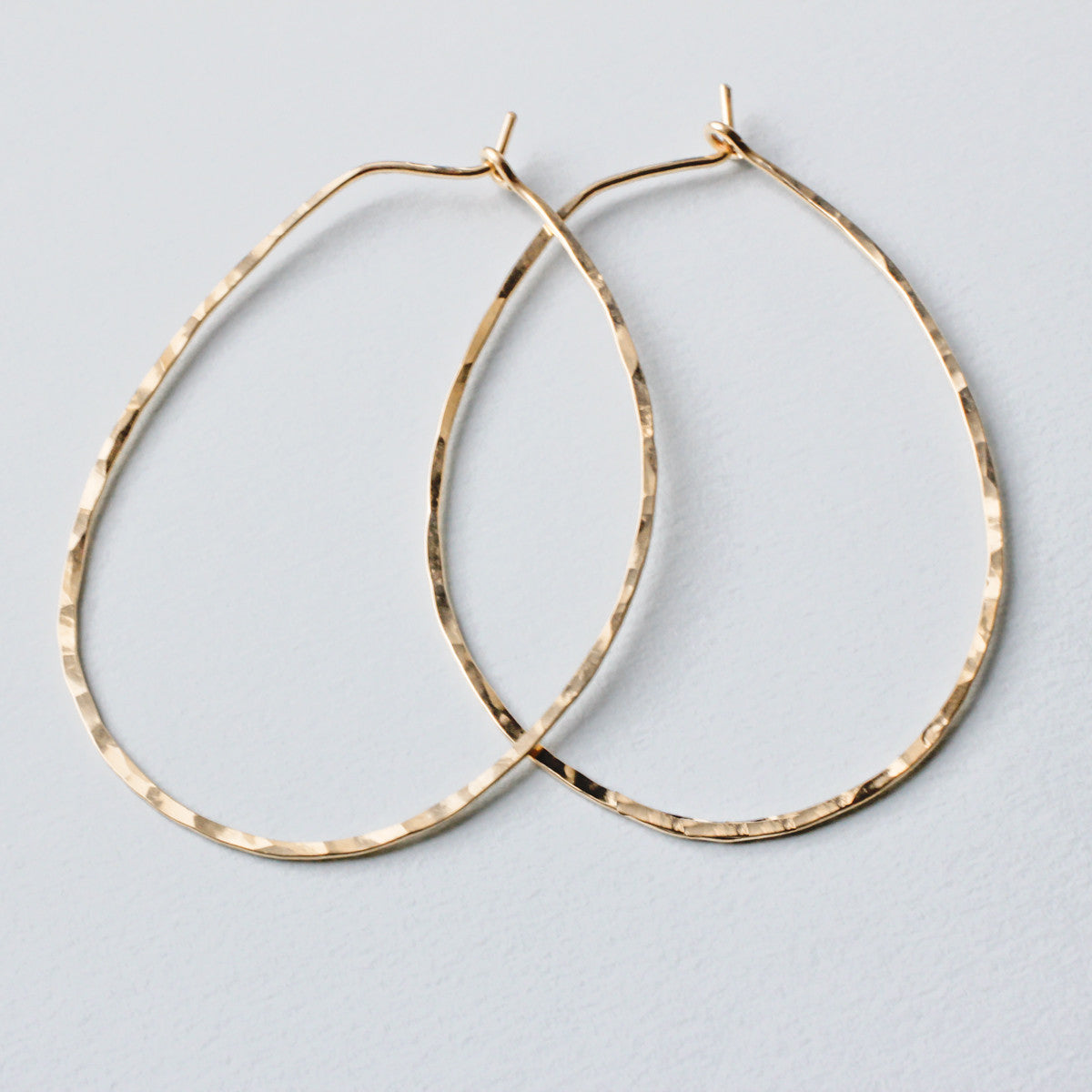 thin Oval Hoop Earrings by delia langan jewelry