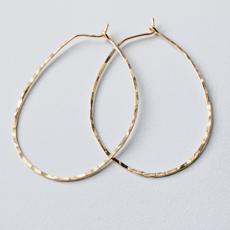 thin Oval Hoop Earrings by delia langan jewelry