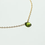 dainty green gemstone peridot necklace on gold chain
