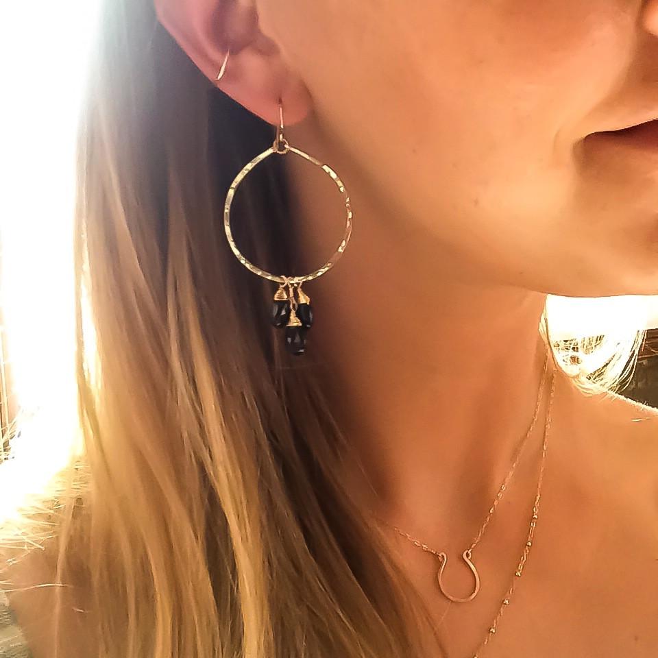 black spinel gemstone and gold hoop earrings by delia langan jewelry