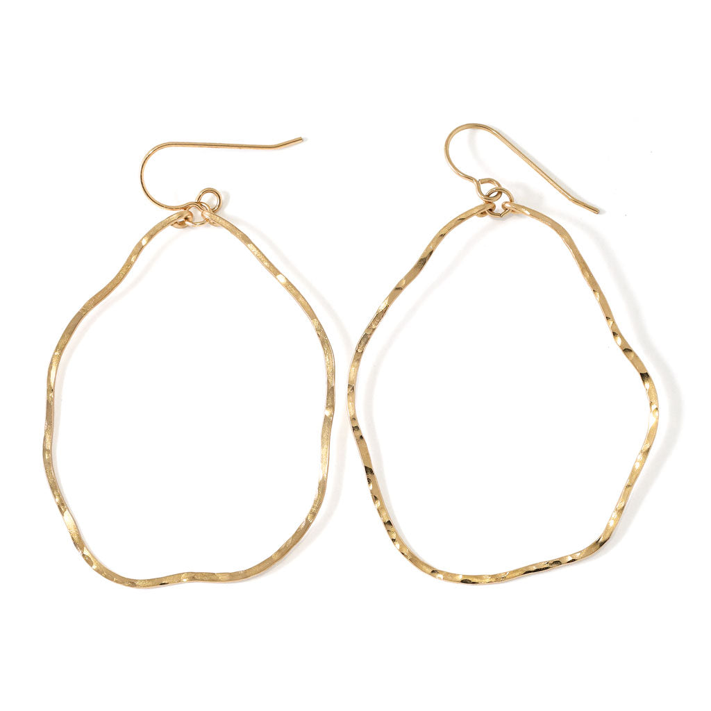 gold wavy irregular hoop earrings hand hammered and handmade by delia langan jewelry