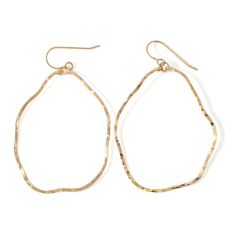 gold wavy irregular hoop earrings hand hammered and handmade by delia langan jewelry