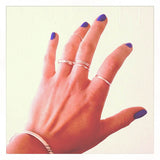 sterling silver stacking rings with blue nails