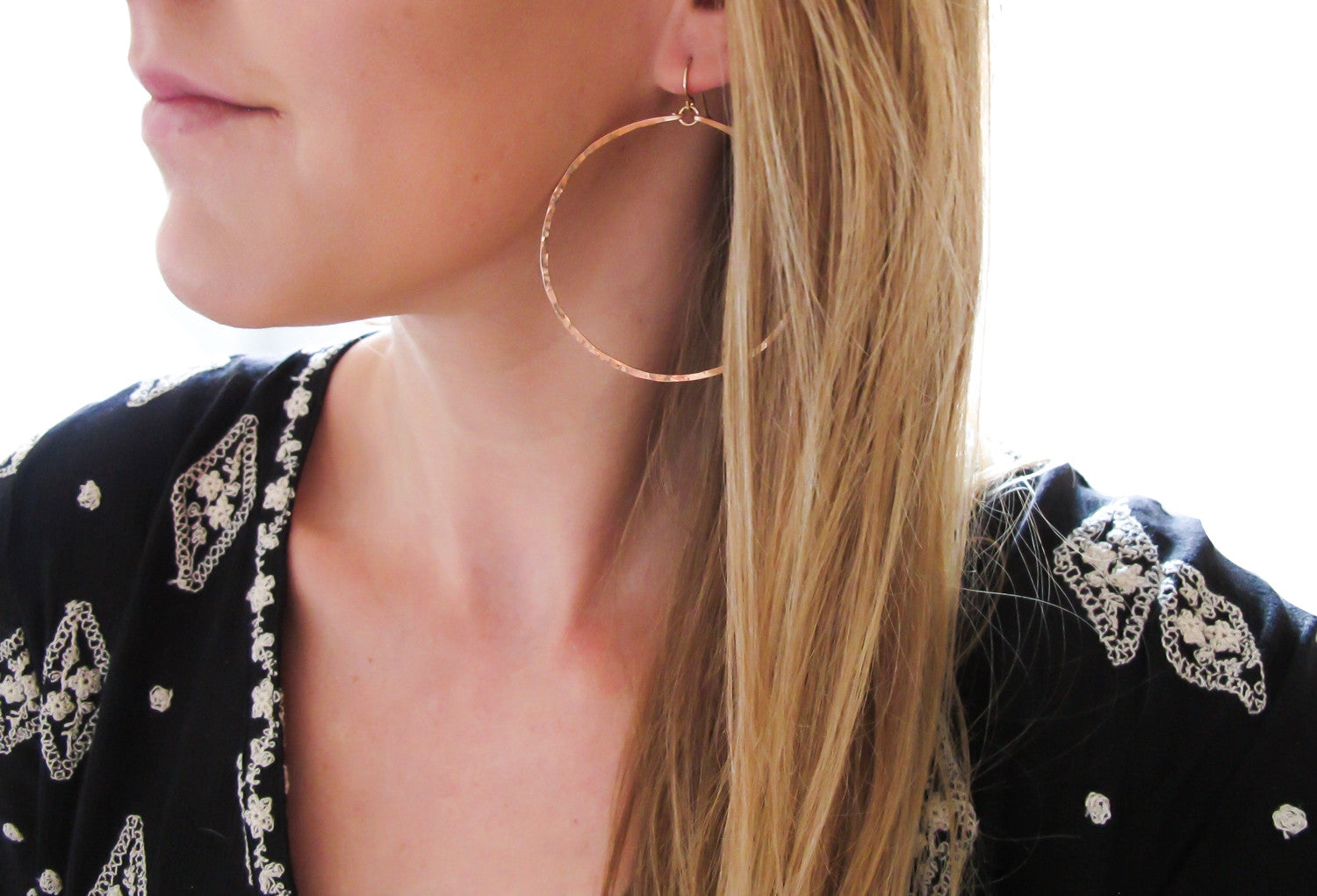 rose gold extra large round hammered hoop earrings handmade jewelry in williamsburg brooklyn by delia langan jewelry
