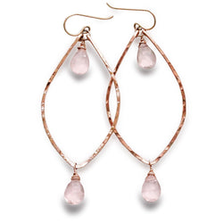 rose quartz rose gold leaf gemstone earrings on a white surface