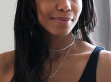 black woman wearing a sterling silver choker double wrap necklace