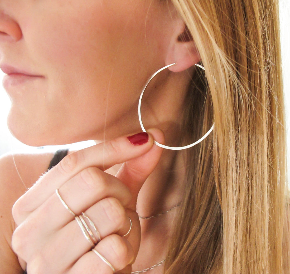 hammered sterling silver hoop earrings by delia langan jewelry