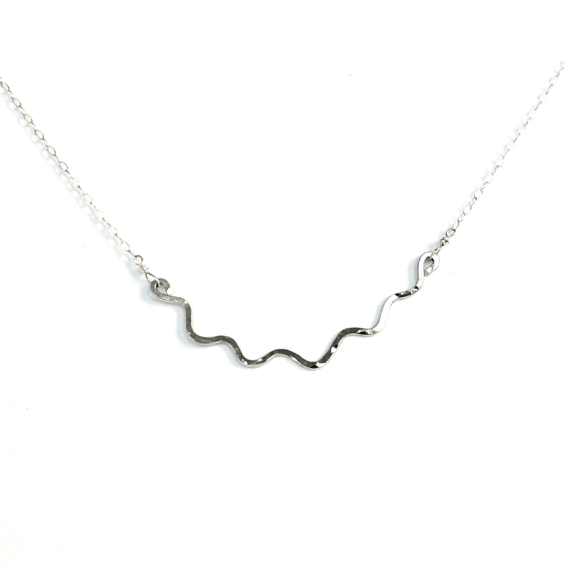 silver wavy hammered delicate necklace by delia langan jewelry