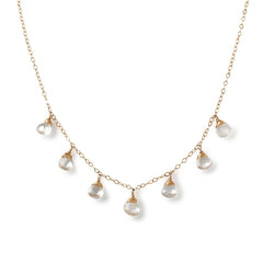 white topaz and 14k gold filled necklace by delia langan jewelry