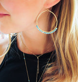 wire wrapped turquoise 14k gold filled hammered hoop earrings handmade by delia langan
