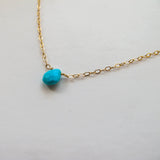 turquoise stone with gold chain
