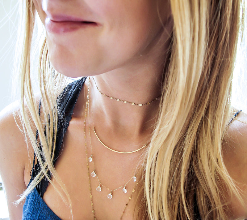 white topaz and gold layering necklaces by delia langan jewelry