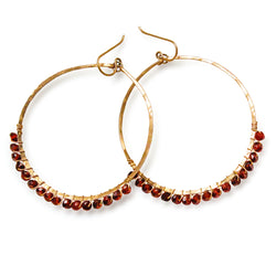 large garnet wire wrapped hoop earrings with red garnet gemstones