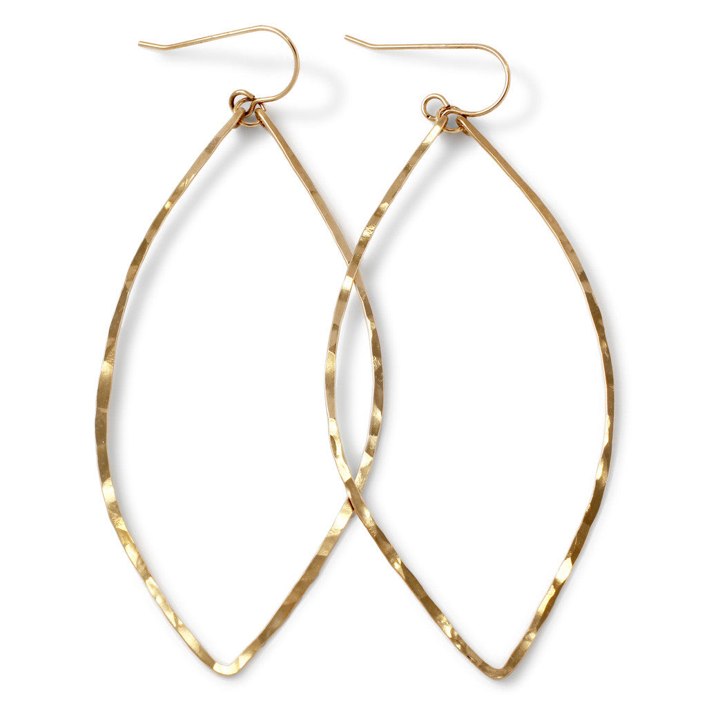 14k gold filled xl leaf hoop earrings on white surface 