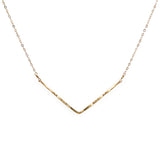 delicate gold hammered chevron v shaped necklace handmade by delia langan jewelry