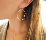 wavy thin hammered organic shaped gold hoop earrings